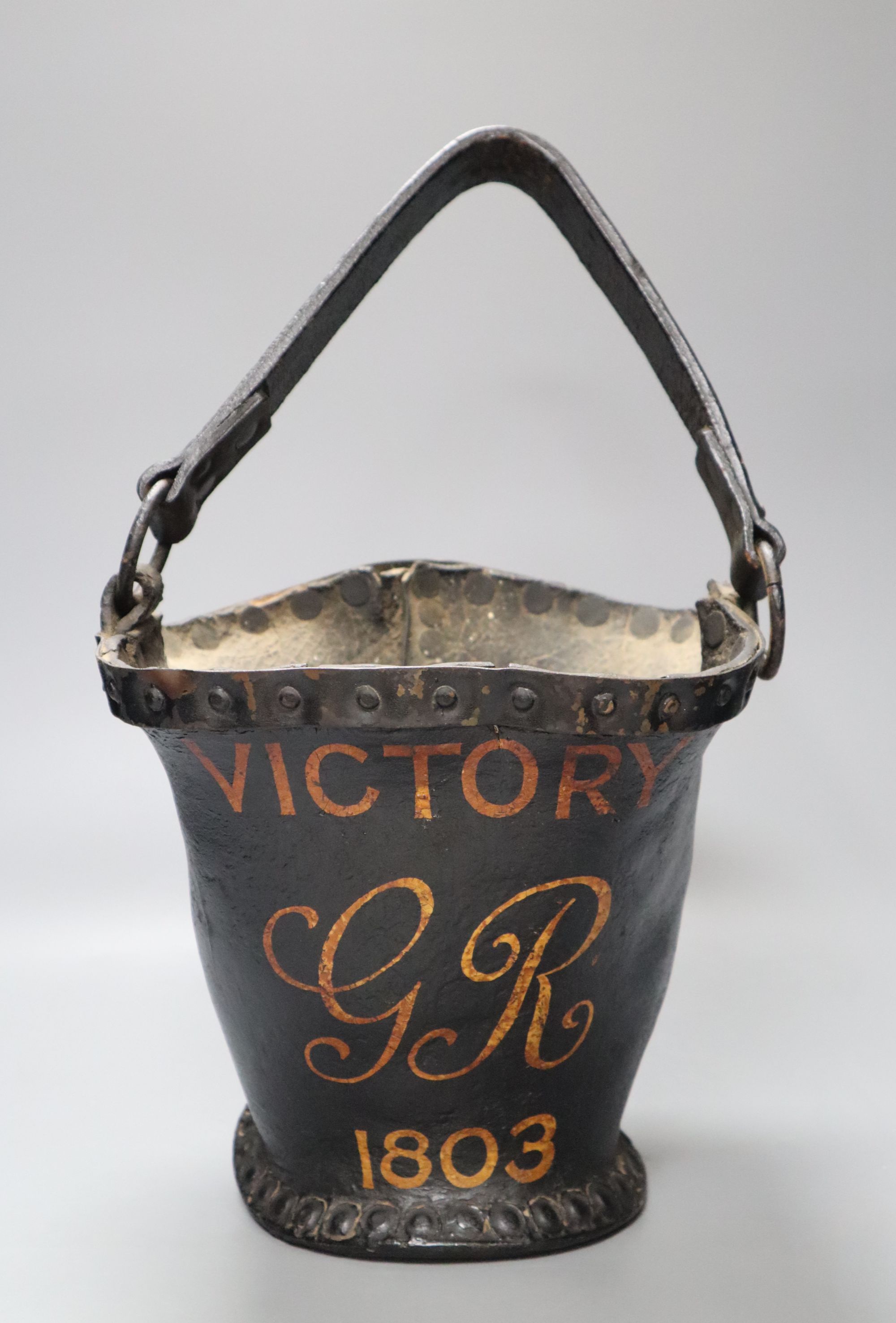 A leather fire bucket, inscribed Victory-GR-1803, height 21cm